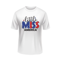 White t-shirt with 'little MISS AMERICA' text in red, blue, and white on a white background